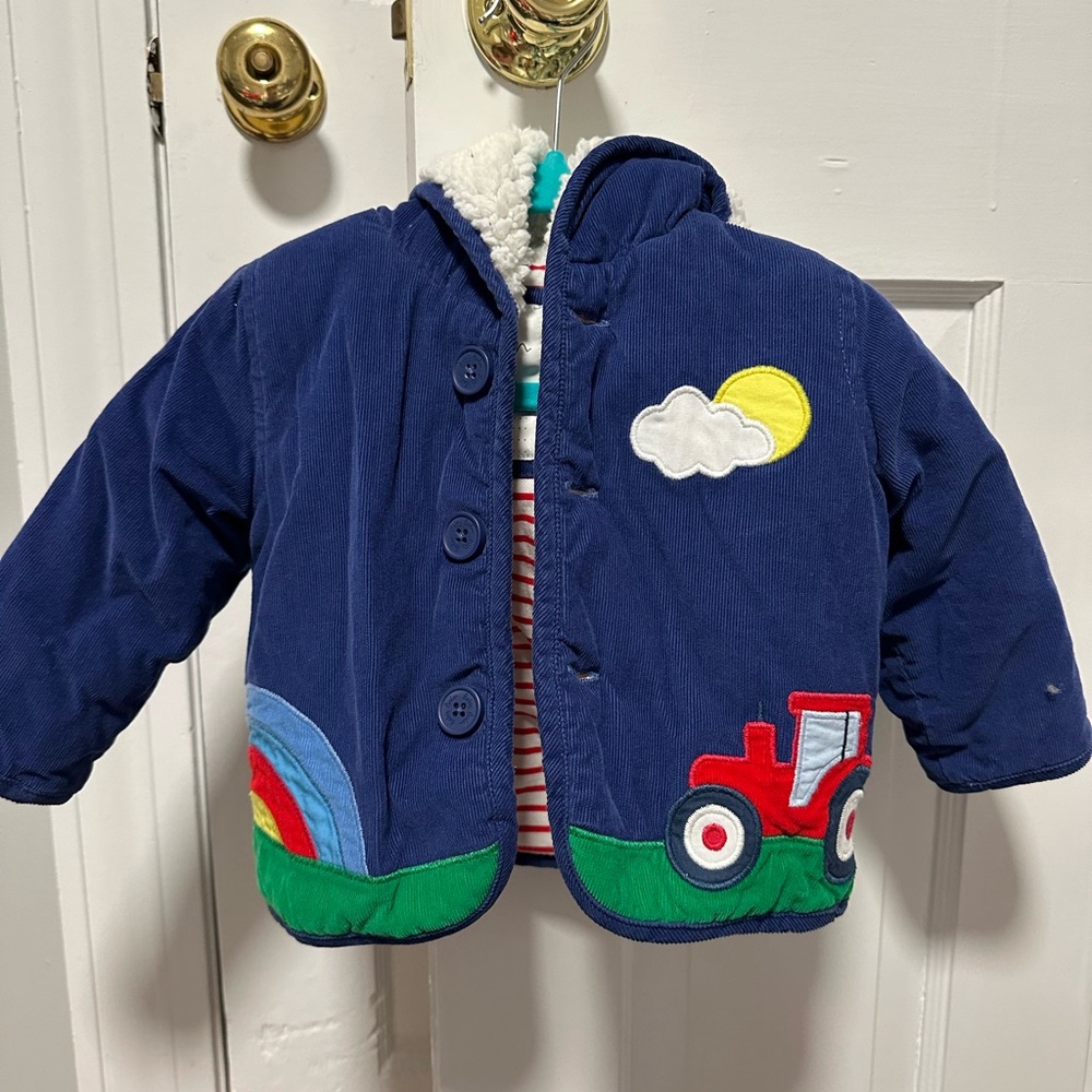 The most adorable jacket! Perfect for Spring Gently used- maybe worn once!